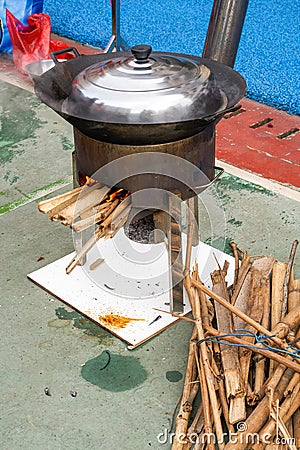 Chinese traditional wood stove, firewood for cooking Stock Photo