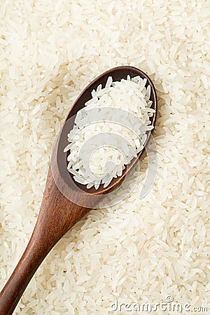 Chinese white rice on teaspoon Stock Photo