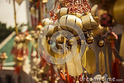 Chinese wishes amulets hanging on the wall in buddhist temple Stock Photo