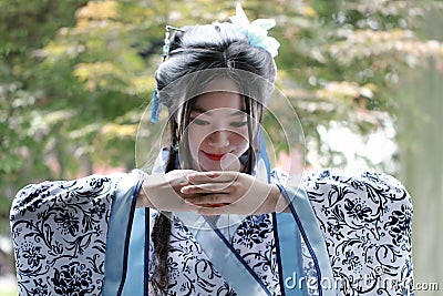 Chinese woman in traditional Blue and white porcelain style Hanfu dress Stock Photo