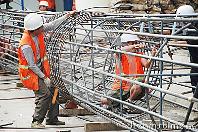 Chinese worker construction lattice Editorial Stock Photo