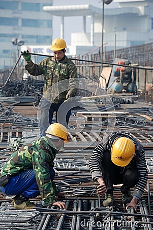 Chinese workers construct viaduct Editorial Stock Photo