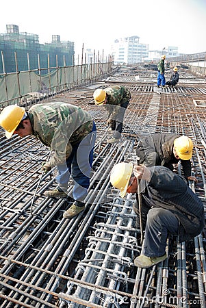 Chinese workers construct viaduct Editorial Stock Photo