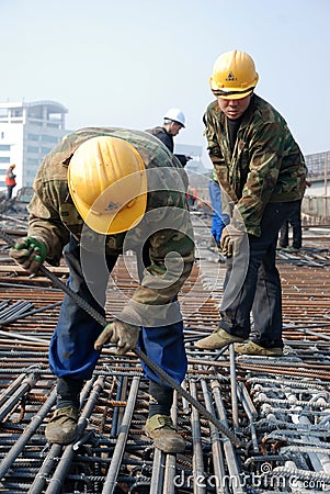 Chinese workers construct viaduct Editorial Stock Photo