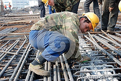 Chinese workers construct viaduct Editorial Stock Photo