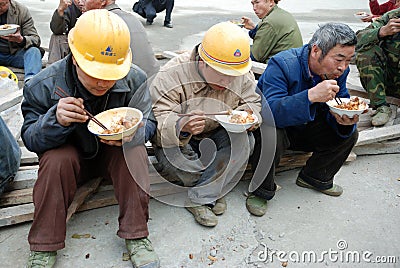 Chinese workers have lunch Editorial Stock Photo