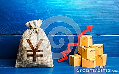 Chinese yuan or japanese yen money bag with boxes and up arrow. Good consumer sentiment and demand for goods. High sales. Stock Photo