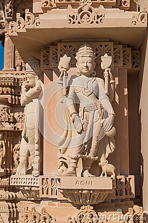 Carving of Goddess of Fire Agni on Exterior of the BAPS Shri Swaminarayan Mandir in Chino Hills, CA Editorial Stock Photo