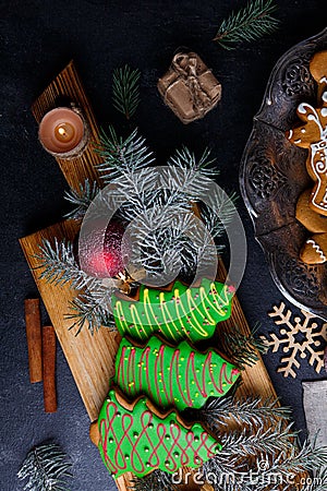 Chipboard with cookies and a slice of a plate on a stone background is shown Stock Photo