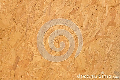 Chipboard light yellow osb surface pressed wooden pattern texture particleboard background construction material Stock Photo