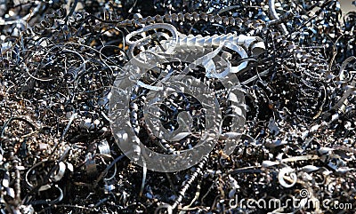 Chips and curls of ferrous metal into landfill for recycling 3 Stock Photo