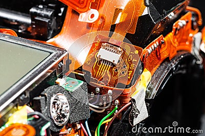 Chips and microcircuits in a disassembled camera close-up Stock Photo