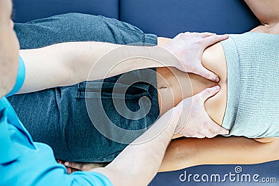 Chiropractic diaphragm myofascial release, osteopath releasing tension in diaphragm muscles Stock Photo