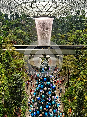 Chirstmas tree with colourful ornament. Nice feeling to be there Jewel Changi Airport Singapore Editorial Stock Photo