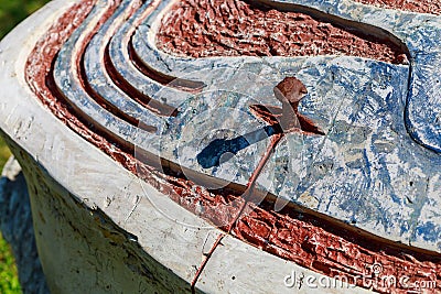 Chisel driven into a stone. A symbolic conceptual monument to diligence and perseverance. Background with copy space Stock Photo