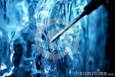 Chisel and ice sculpture Stock Photo