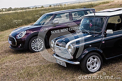 Chisinau, Moldova. July 14, 2016 : Mini Cooper club festival in Moldova. Orange MINI Cooper in dark forest on July 14, 2016 in Chi Editorial Stock Photo