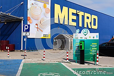 Chisinau, Moldova - October 17, 2021: Power supply for electric car charging in the Metro Cash and Carry parking lot. Electric car Editorial Stock Photo