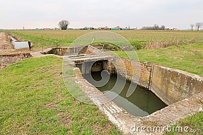 Chiusa ditch river agriculture water transfer panorama landscape agricultural work Italy Italian Stock Photo