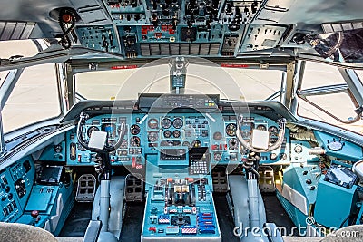 Chkalovski Airport, Moscow Region, Russia - August 12, 2018: Overview in pilot`s cockpit of military transport aircraft Antonov A Editorial Stock Photo