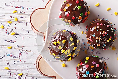 Chocolate apples with sprinkles candy close up horizontal top vi Stock Photo