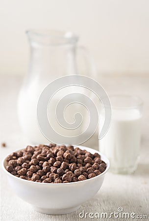 chocolate balls, fresh cows milk Stock Photo