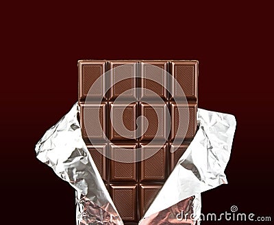 Chocolate bar with open cover Stock Photo