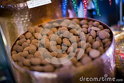 Chocolate beads filled in cacao close up Stock Photo