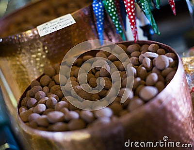Chocolate beads filled in cacao close up Stock Photo
