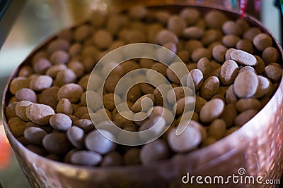 Chocolate beads filled in cacao close up Stock Photo