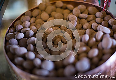 Chocolate beads filled in cacao close up Stock Photo