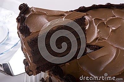 Chocolate Cake being sliced Stock Photo