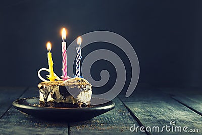 Chocolate cake with a candle and gifts.Happy Birthday, card. Holidays greeting card. Stock Photo