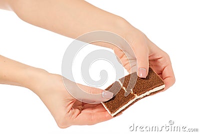 Chocolate cake candy biscuit milk in hand Stock Photo