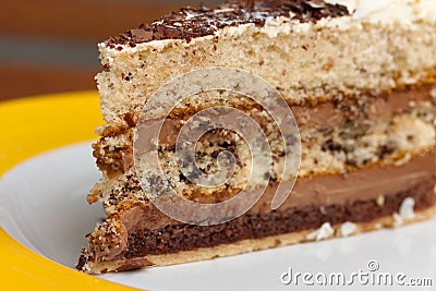 Chocolate cake with cream,cherry, fruits and cocoa Stock Photo