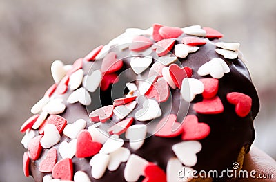 Chocolate cake. Donut covered with chocolate. Edible cupcake. Edible Donat. Cupcake with a hole. Romantic cupcake. Stock Photo