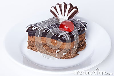 Chocolate cake with icing decor, cherry, maraschino, dried, cocktail Stock Photo