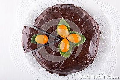 Chocolate cake on white wooden table Stock Photo