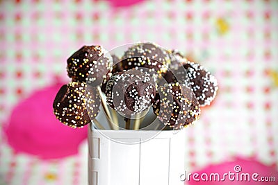 Chocolate cake pops with colorful sprinkles Stock Photo