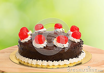 Chocolate cake with red cheery Stock Photo