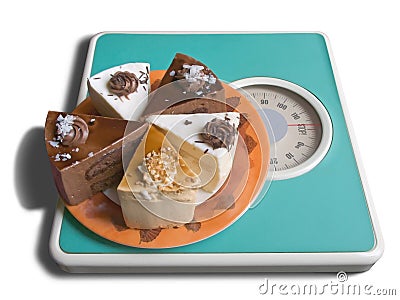 Chocolate cake on weigh-scale Stock Photo