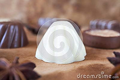 Chocolate candies on brown background Stock Photo