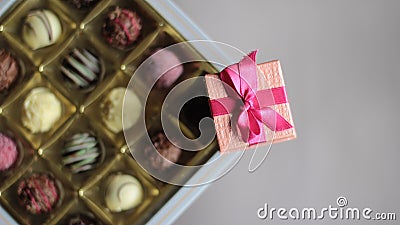 Chocolate candy box and pink jewelery box Stock Photo