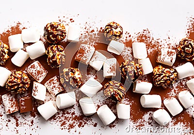 Chocolate, caramel popcorn and marshmallows Stock Photo