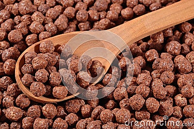 Chocolate cereal balls in a spoon Stock Photo