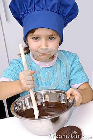 Chocolate Chef kid. Stock Photo