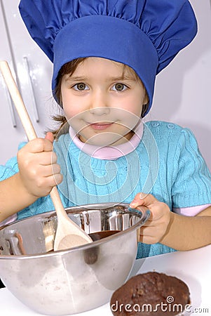 Chocolate Chef kid. Stock Photo
