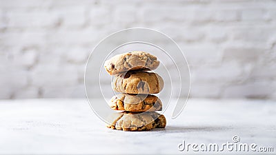 Chocolate chip cookies and a glass of milk on a white background Stock Photo