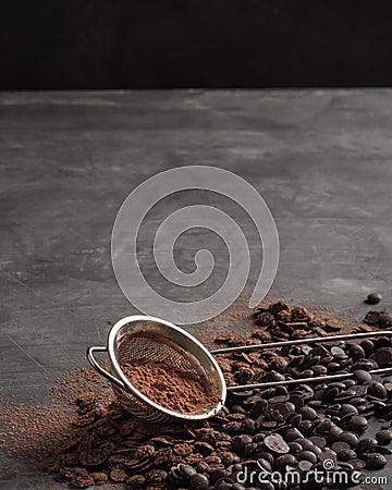 Chocolate chips, cocoa powder. Copy space. Vertical photo Stock Photo