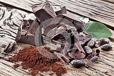 Chocolate and cocoa bean over table. Stock Photo